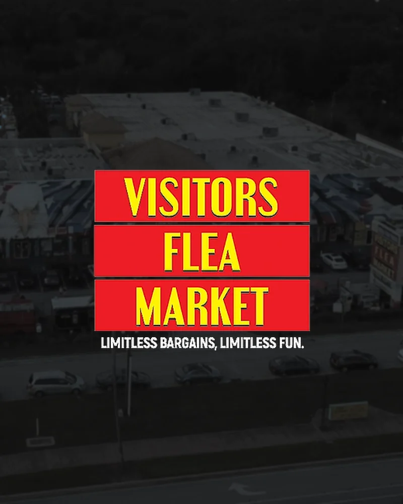 The Visitors Market entrance on Highway 192, under the muralled building.